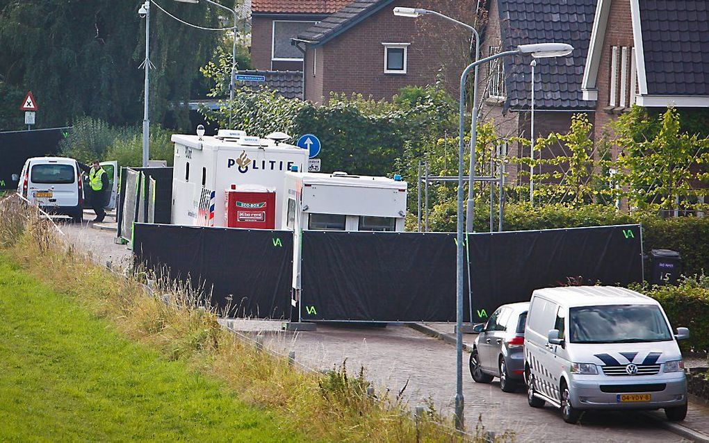 De politie onderzoekt het huis in Kekerdom. Foto ANP