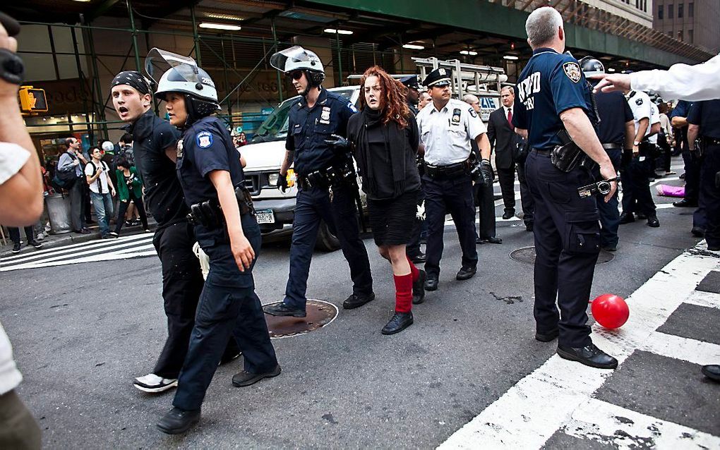 De politie in New York heeft zeker 35 betogers gearresteerd nabij Wall Street.  Foto EPA