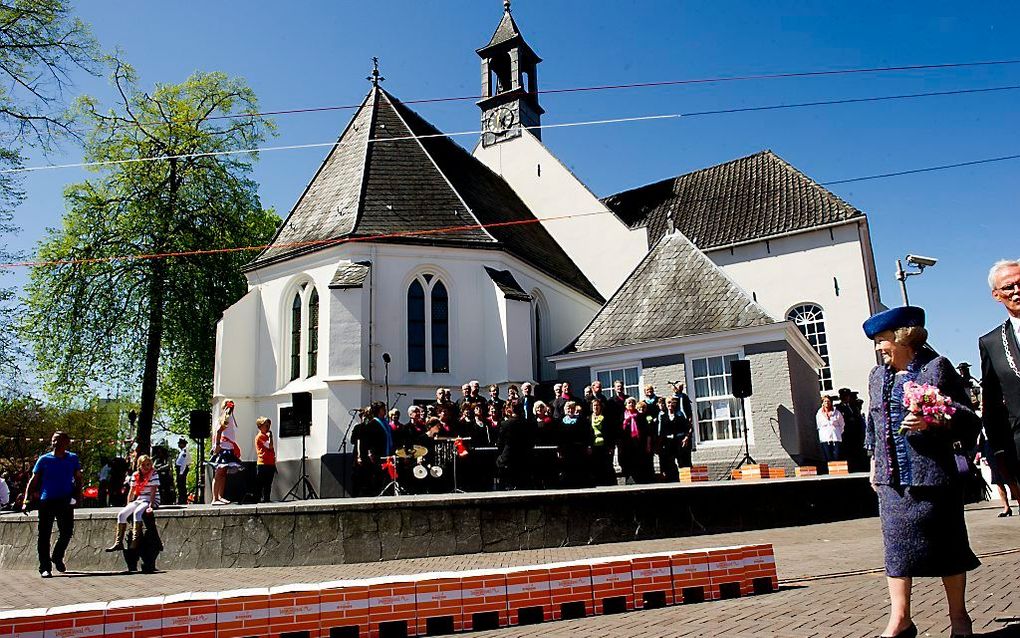 Koningin Beatrix tijdens Koninginnedag 2012 in Veenendaal. Foto ANP