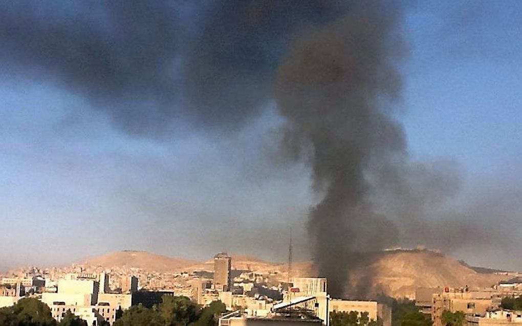 Rookwolken boven Damascus. Foto EPA