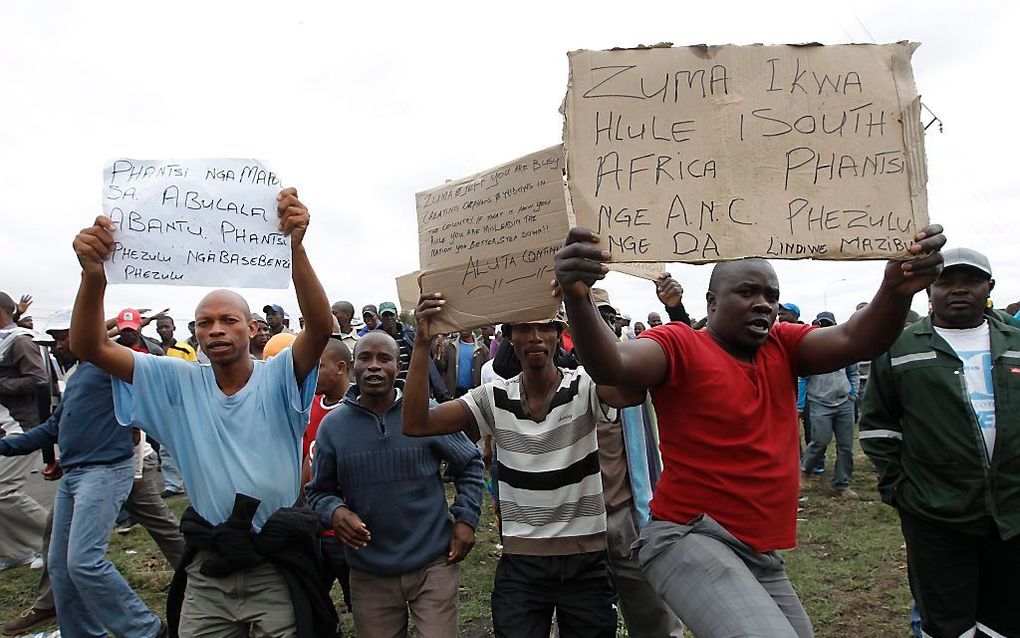 Stakende mijnwerkers in Zuid-Afrika.  Foto EPA