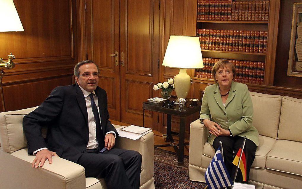 Merkel spreekt dinsdagmiddag met Samaras. Foto EPA