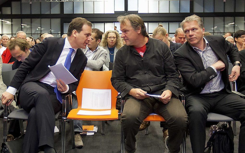 Lodewijk Asscher, Hans Spekman en Wouter Bos op het partijcongres.   Foto ANP