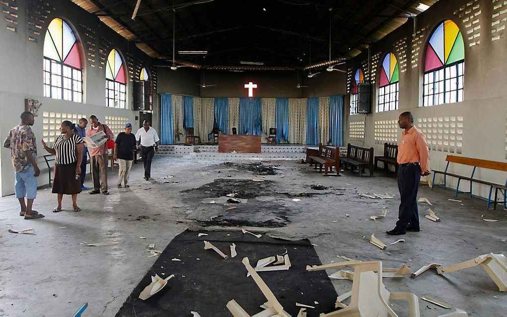 Een aanslag op zondag op een kerk in Garissa in Kenia kostte één persoon het leven. Elf mensen raakten gewond. Foto: ravage na een aanslag op een kerk in de Keniase havenstad Mombassa eind augustus. Foto EPA