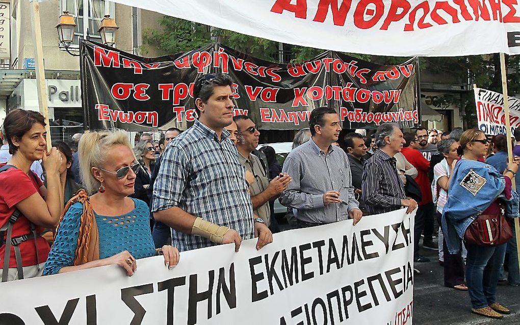 Stakende journalisten in Athene.  Foto EPA