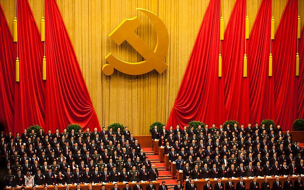 De Chinese president Hu Jintao heeft tijdens het congres van de Communistische Partij opgeroepen tot politieke hervormingen binnen zijn partij. Op de foto de openingsceremonie van het congres. Foto EPA