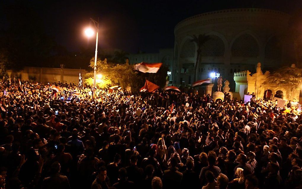 Aanhangers van de oppositie rukten vrijdagavond op naar het paleis van Mursi. Foto EPA