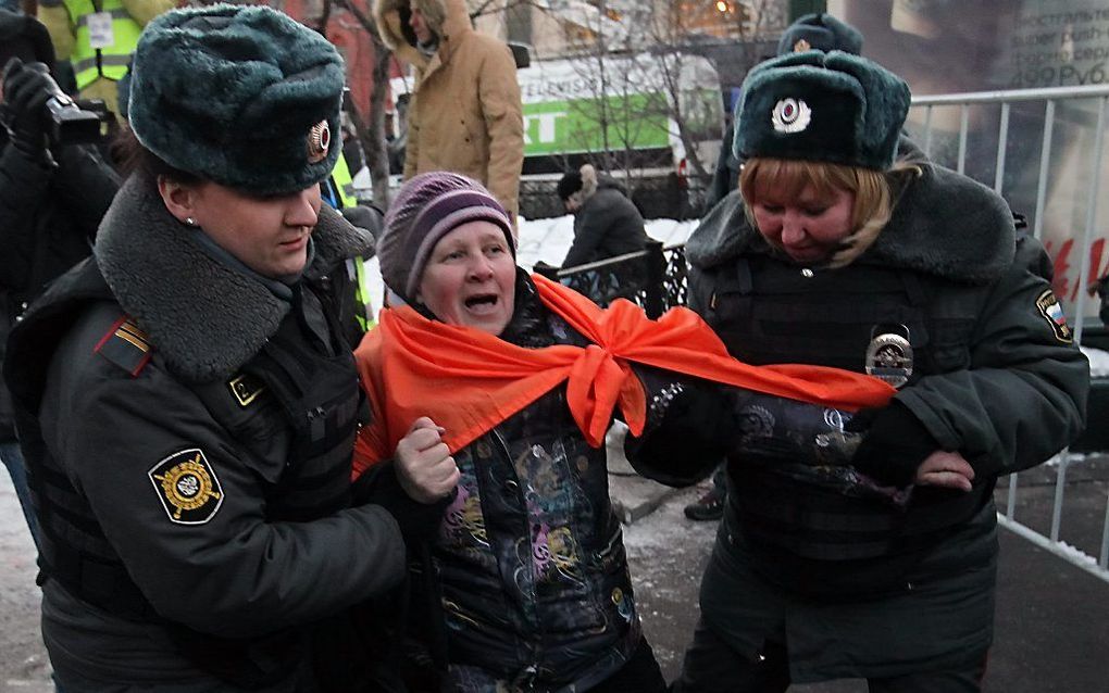 Politie in Moskou maakt eind aan betoging.  Foto EPA