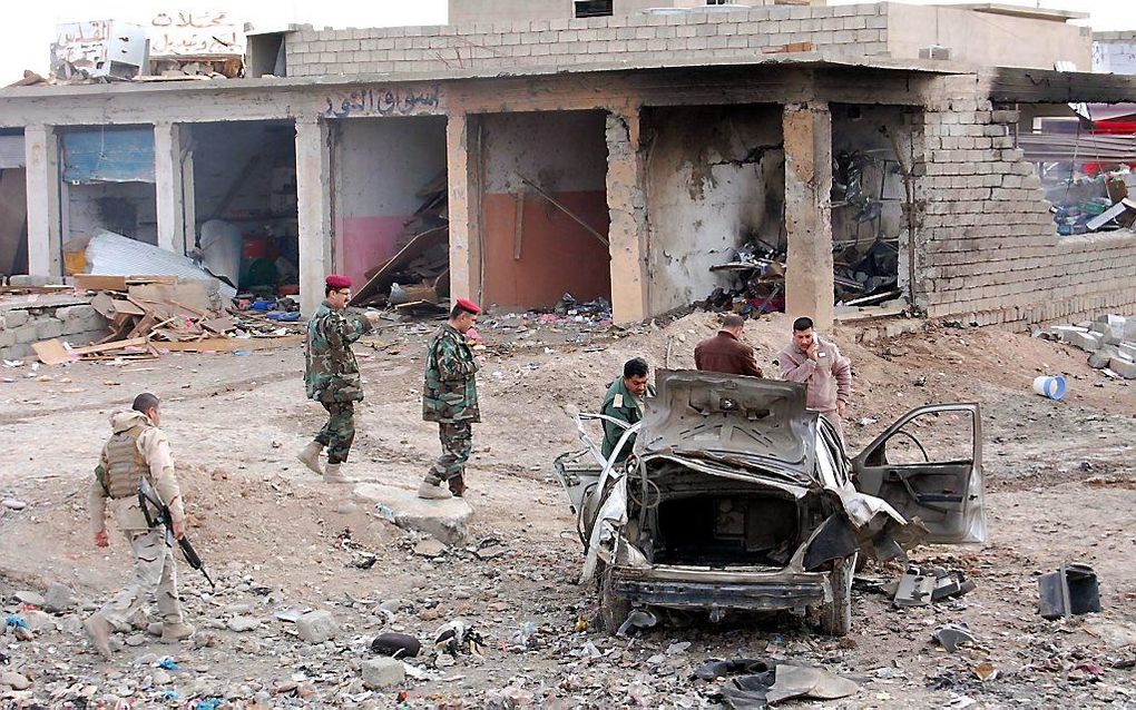 Ravage na een terroristische aanslag met een autobom vorig jaar in Mosul. Foto EPA