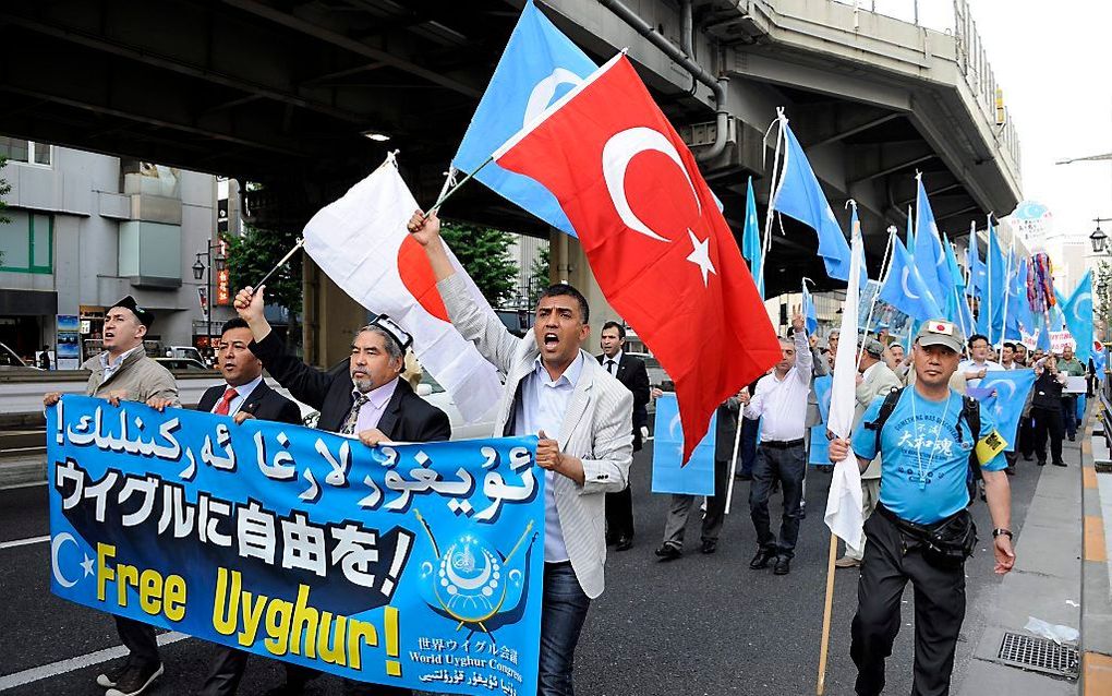 Oeigoeren demonstreren in Japan tegen China. Foto EPA