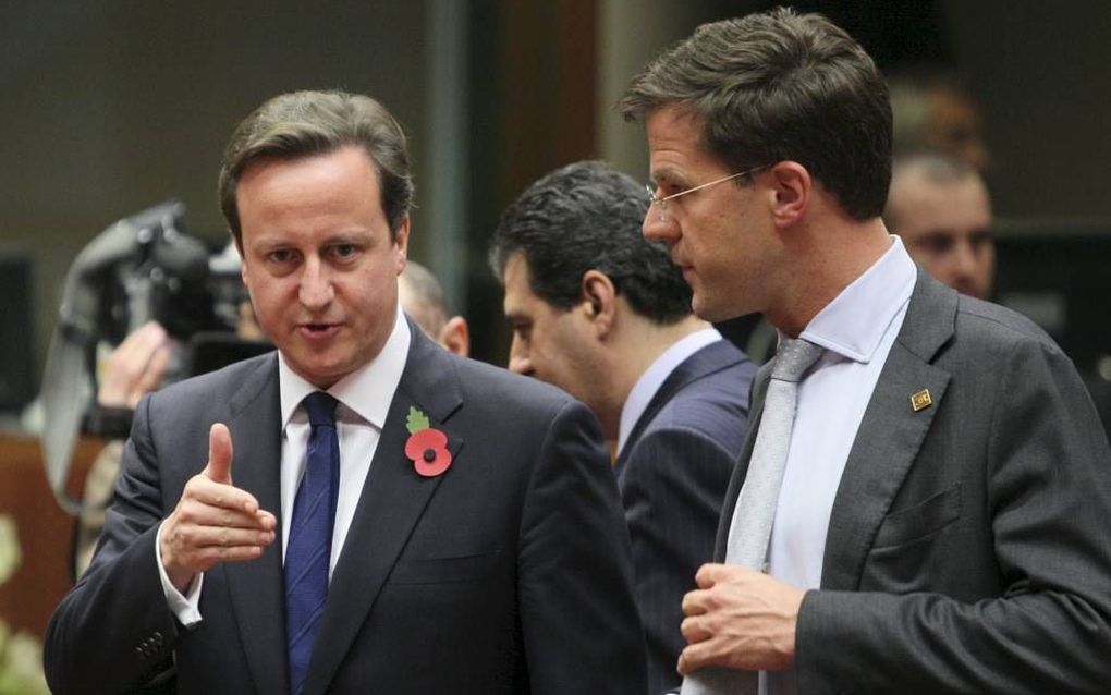 De Britse premier Cameron (l.) met zijn Nederlandse collega Rutte.  Foto ANP