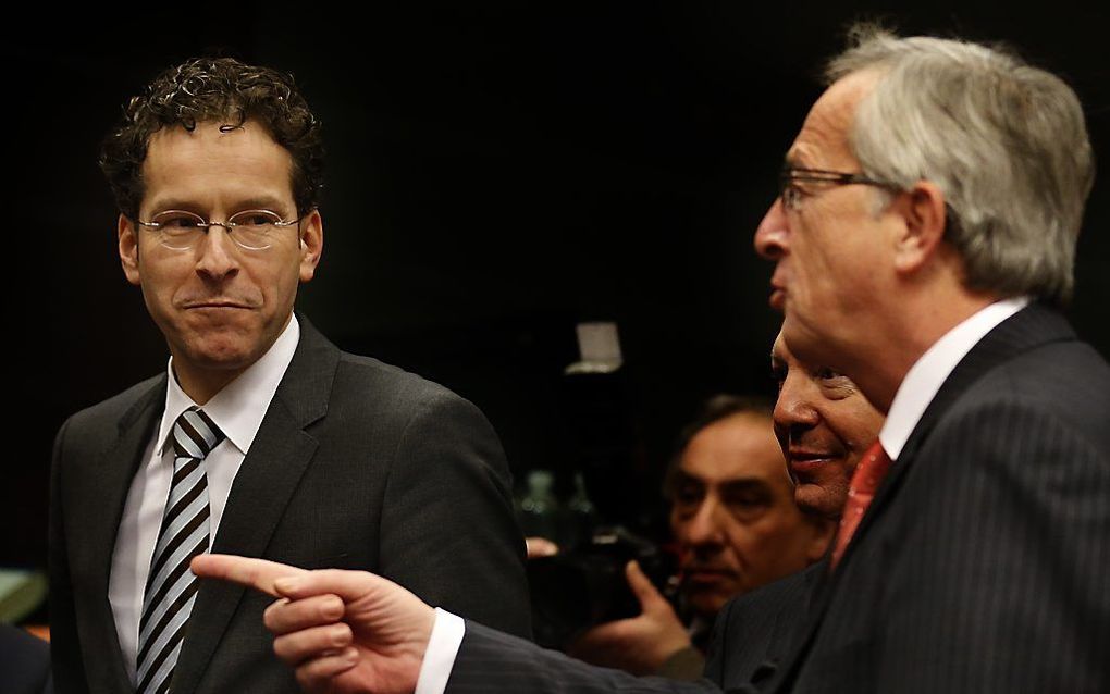 Minister Dijsselbloem in gesprek met Jean-Claude Juncker.  Foto ANP