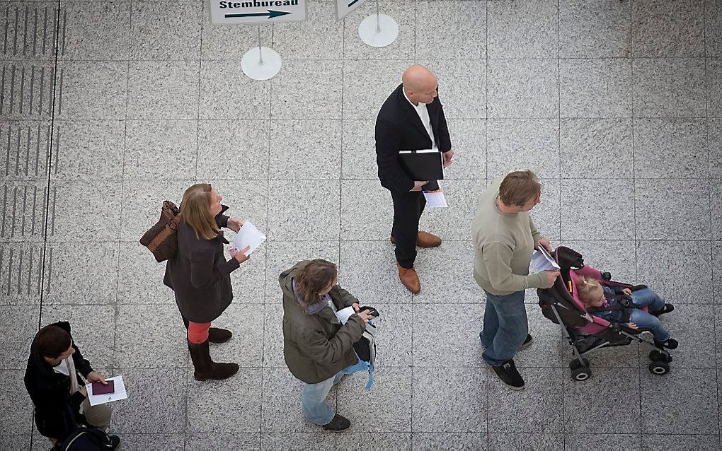 Burgemeester Van Aartsen van Den Haag besloot afgelopen zomer de stembureaus in kerken te sluiten om een lage opkomst te voorkomen. Onderzoek van de Haagse CDA-fractie zet die argumentatie op losse schroeven. Foto ANP