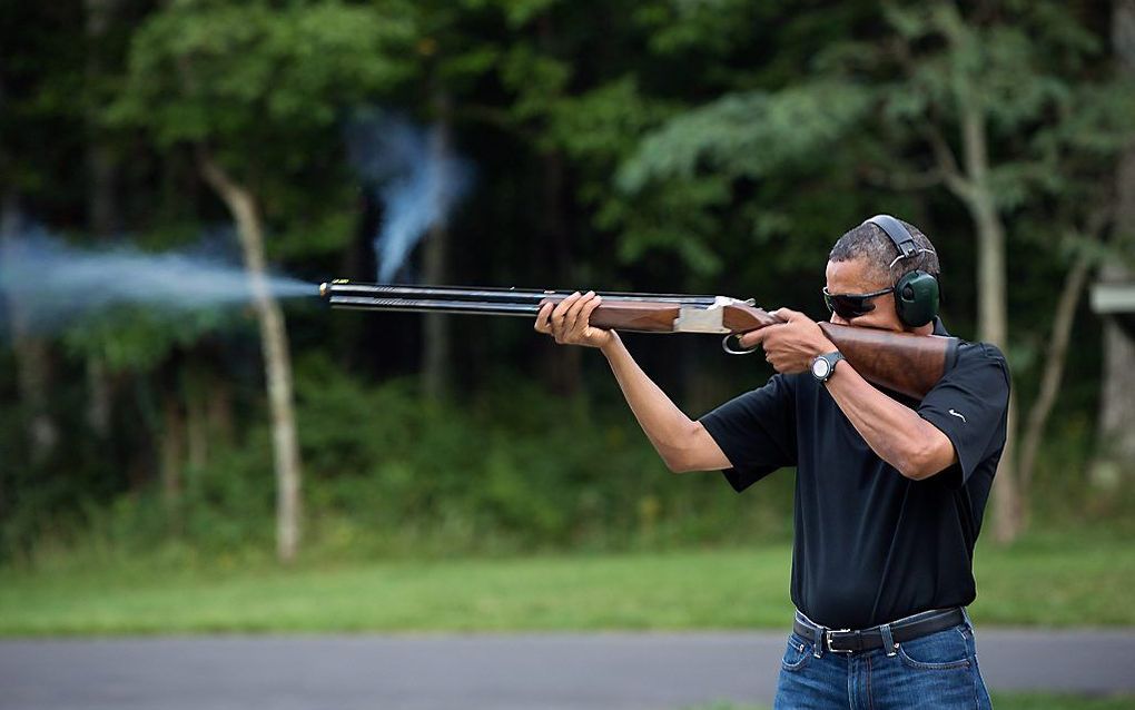 Obama mag in zijn vrije tijd graag kleiduivenschieten op Camp David. Foto EPA