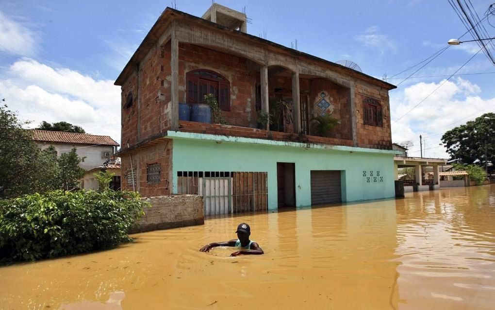 De Braziliaanse deelstaat Rio de Janeiro gaat de risico’s op overstromingen in kaart brengen. Gemeenten moeten in hun bouwplannen hiermee rekening houden. Bouwen in kwetsbare gebieden moet op die manier worden voorkomen. Foto EPA