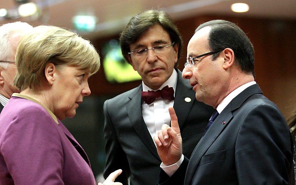 Merkel, Di Rupo en Hollande tijdens de EU-top. Foto EPA