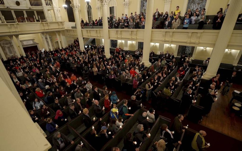 In de Arlington Street Church in Boston werd dinsdag een wake gehouden ter nagedachtenis aan de slachtoffers van de bomaanslag van afgelopen maandag. beeld EPA