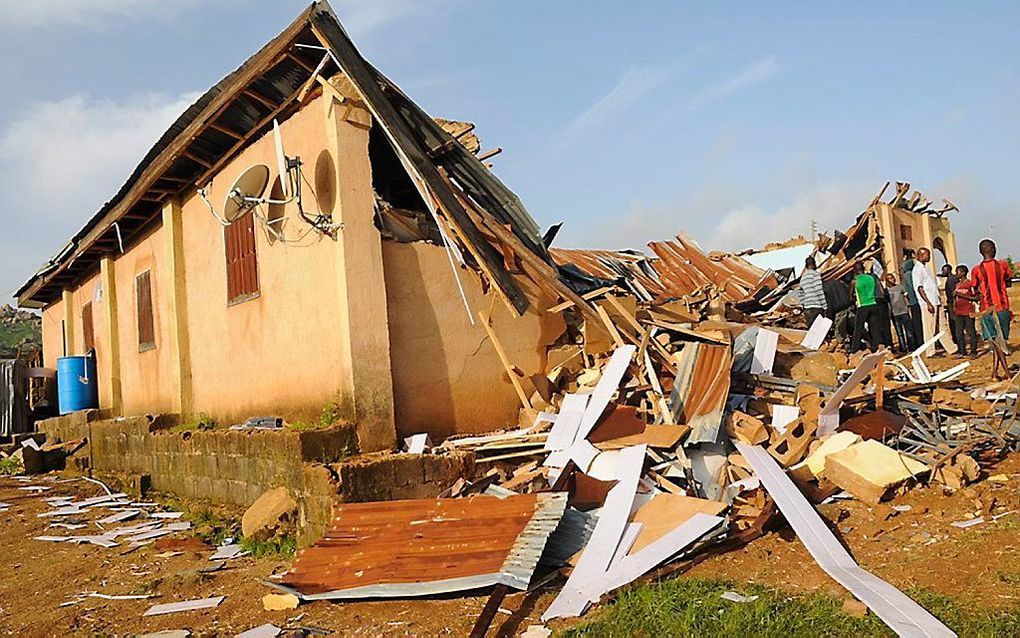 Verwoest kerkje in Nigeria.  Foto EPA