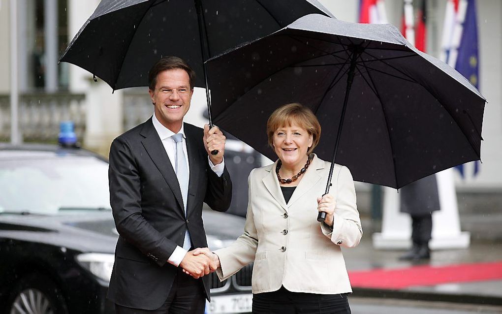 Rutte en Merkel. Foto EPA