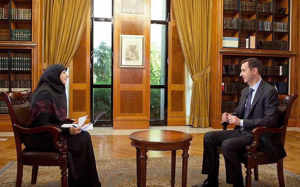 De Syrische president Bashar al-Assad tijdens een tv-interview. Foto EPA