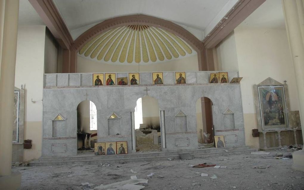 De kerk in het Syrische Qusair is door radicalen vernield. Begin deze maand heroverde het Syrische leger de stad bij de grens met Libanon. Beeld EPA