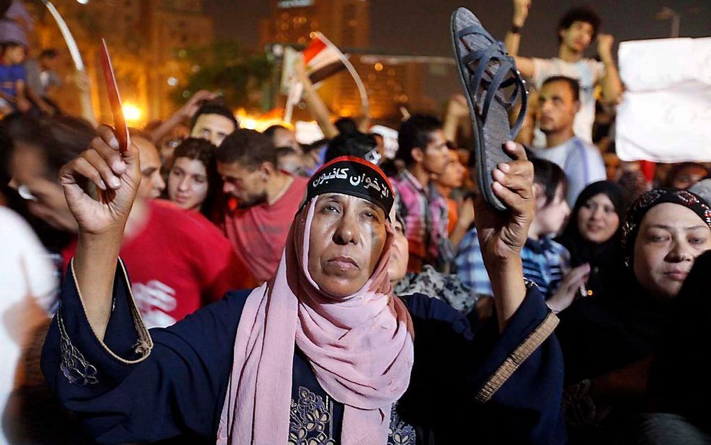 Demonstratie tijdens de toespraak van Mursi. Foto EPA