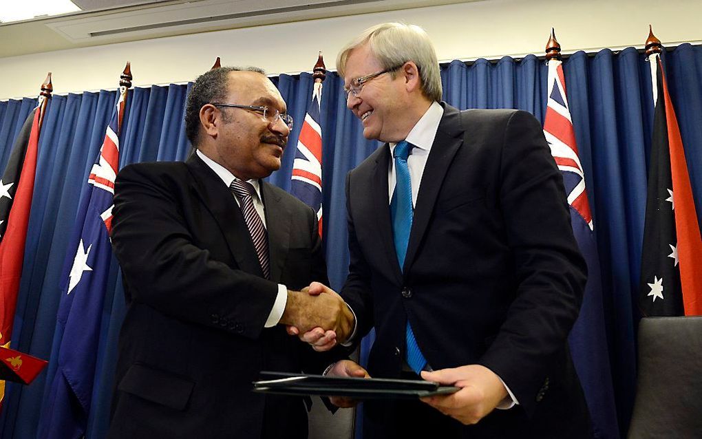 Minister-president van Papoa-Nieuw Guinea (links) en Australië (rechts). Beeld EPA