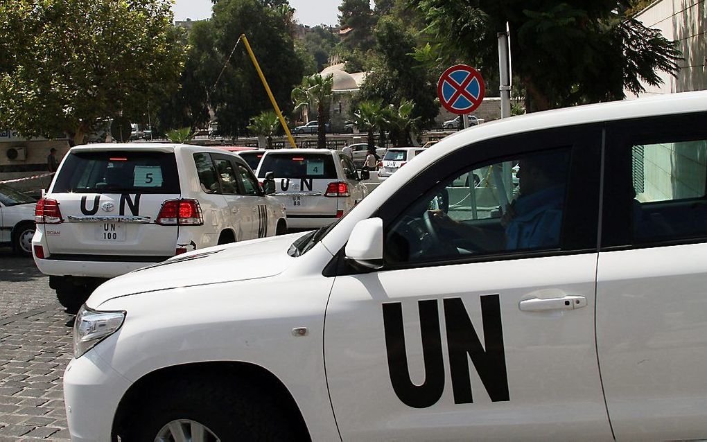 Het konvooi met de VN-inspecteurs, maandag in Damascus. Foto EPA