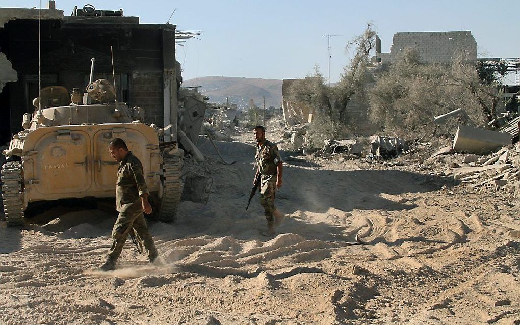 Syrische militairen in Jobar, een buitenwijk van Damascus. Foto EPA