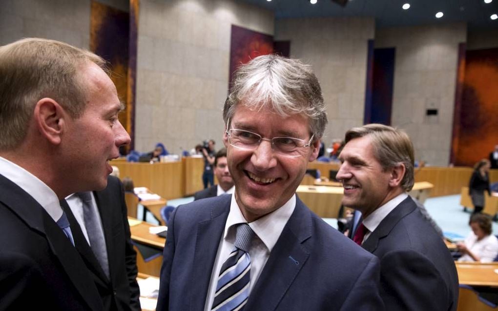 CU-leider Slob (m.) en zijn SGP-collega Van der Staaij (l.) vroegen woensdag ook om aandacht voor immateriële zaken. Beeld Dirk Hol