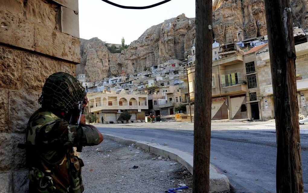 Beeld van Malula, een christelijke stad in Syrië. Beeld EPA