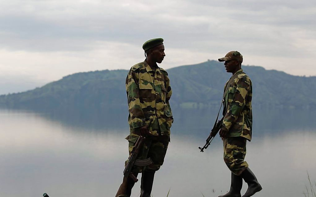 Rebellen van de Congolese militie M23 bij het Kivumeer in Oost-Congo, november 2012. Foto EPA