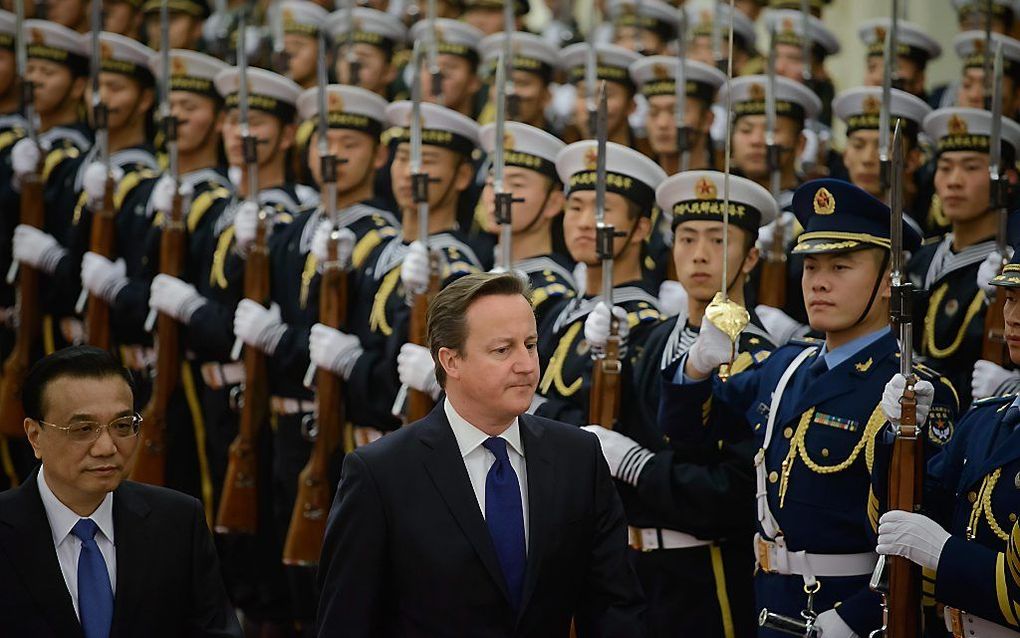 De Britse premier Cameron en zijn Chinese ambtsgenoot Li Keqiang. beeld EPA