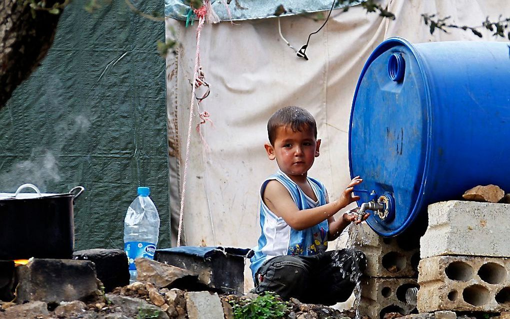 Syrisch kind in een vluchtelingenkamp in Libanon. Foto EPA