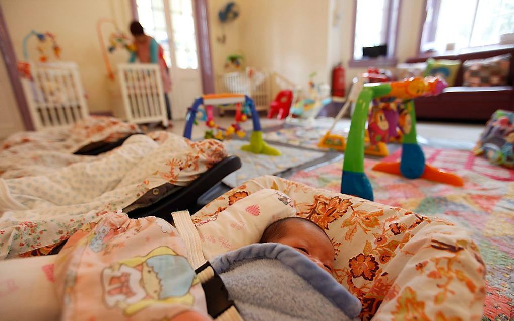 Een Chinese vrouw sleept de autoriteiten in haar land voor de rechter, om een torenhoge boete voor het overtreden van de een-kindpolitiek van tafel te krijgen. beeld EPA