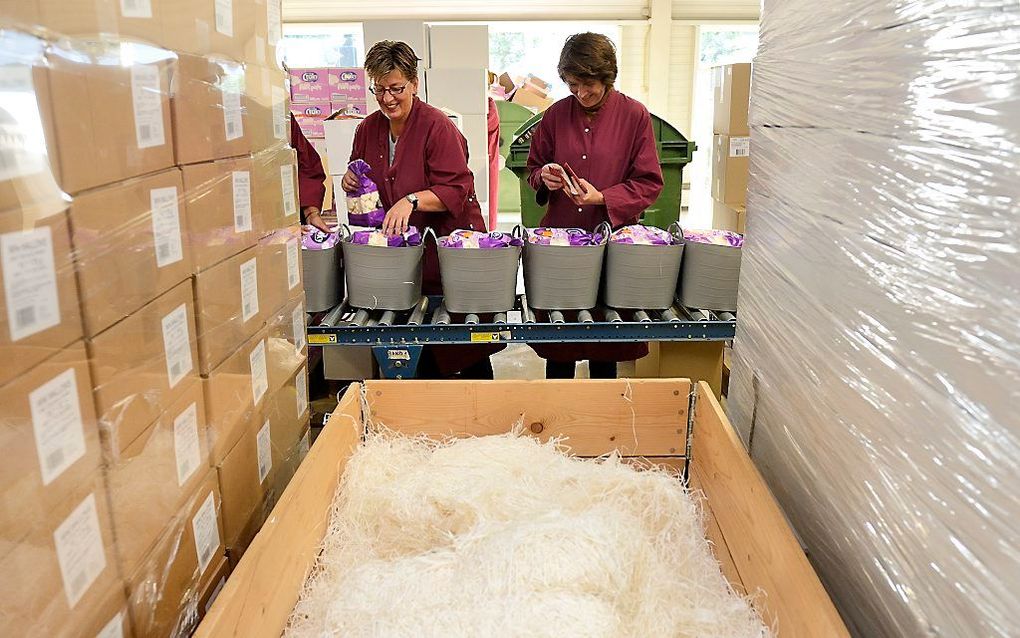 Minder bedrijven geven hun personeel dit jaar een kerstpakket.  beeld ANP