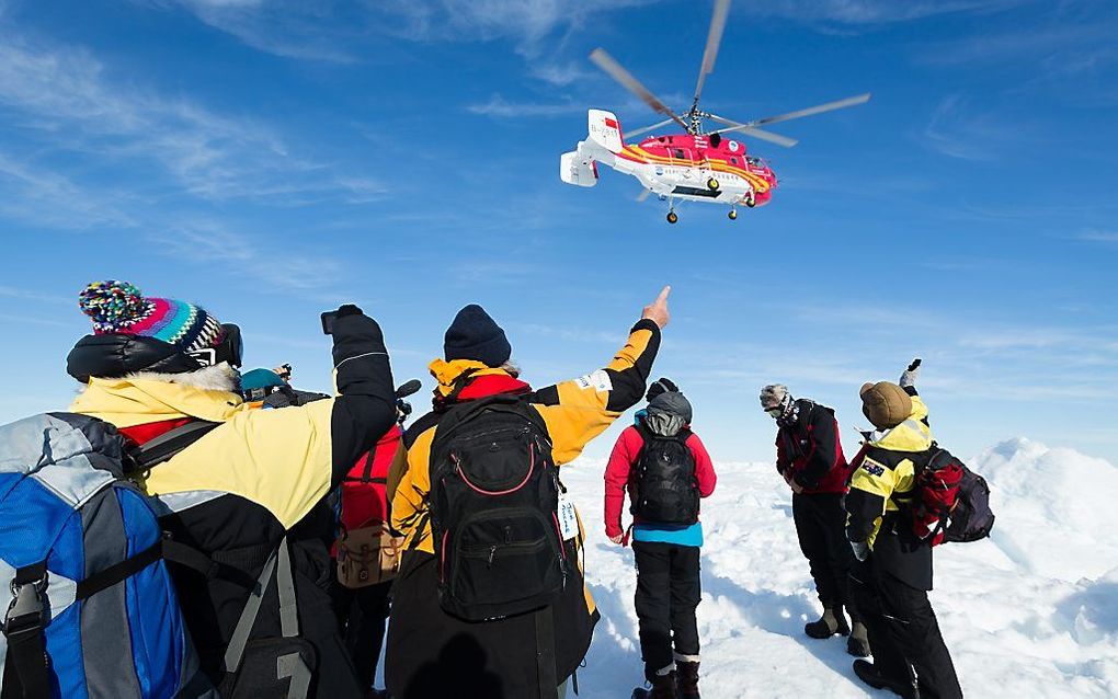 Een Chinese helikopter tijdens de reddingsactie eerder deze week. Foto AFP