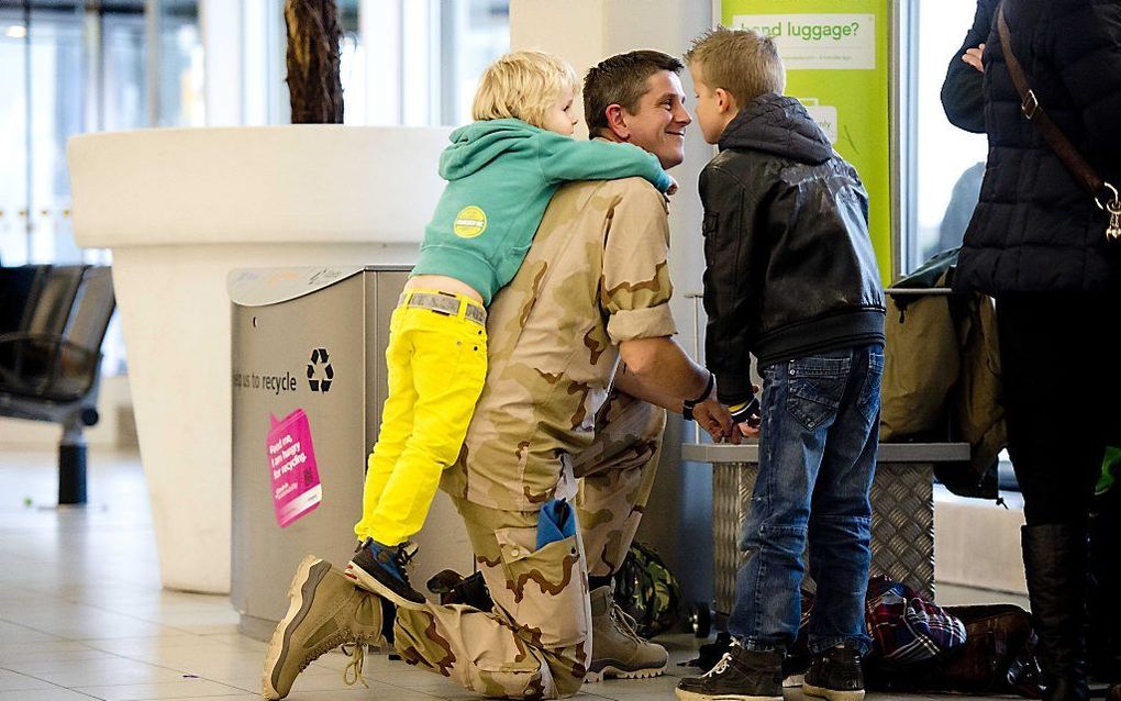 Nog even spelen met de kinderen. Foto ANP