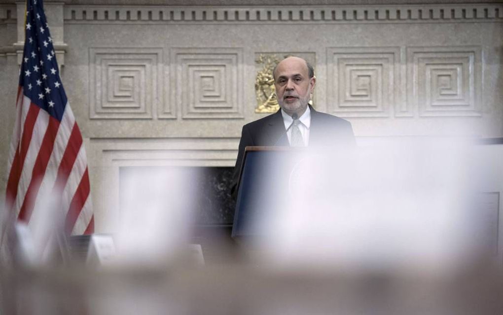 Bij de Federal Reserve (Fed) vindt deze week aan de top een wisseling van de wacht plaats. Ben Bernanke zwaait na acht jaar af als voorzitter. Foto: Bernanke aan het woord tijdens een bijeenkomst, afgelopen december, ter gelegenheid van het honderdjarig b