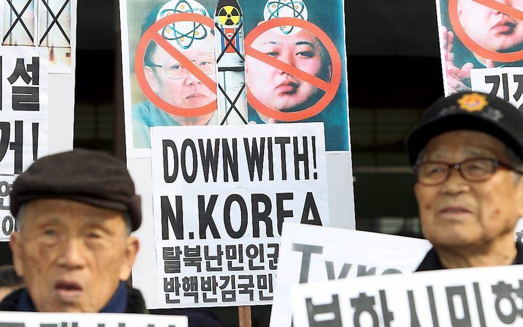 Zuid-Koreanen protesteren tegen Noord-Korea. beeld EPA