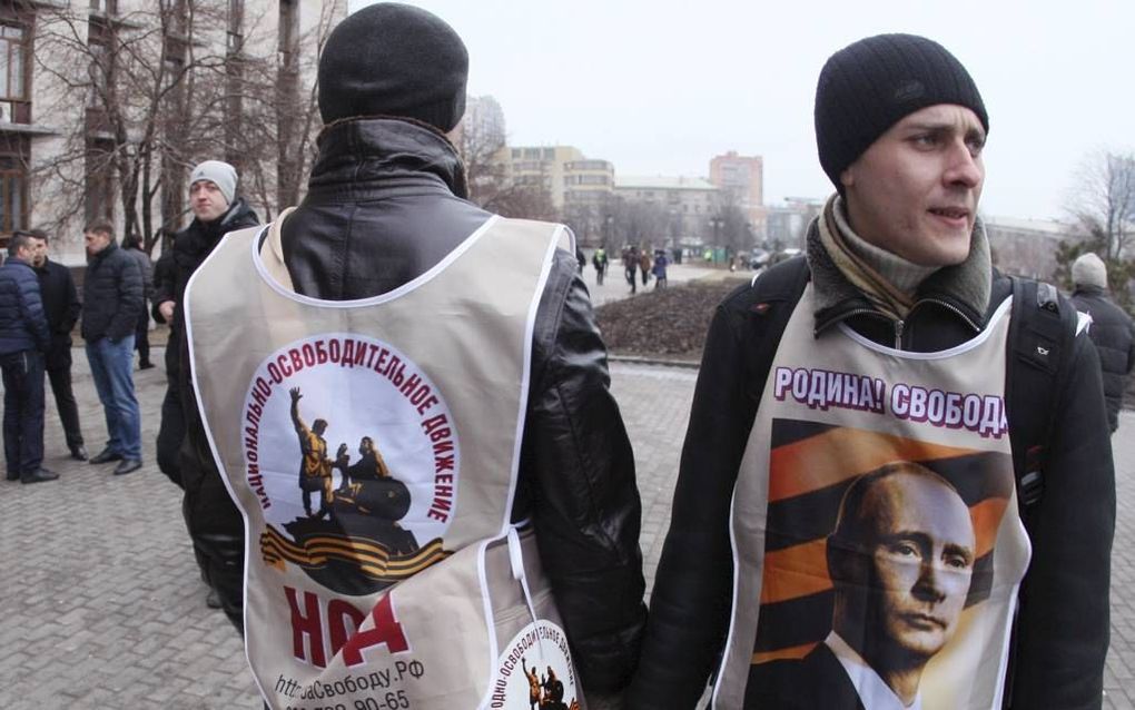 (Pro-)Russische demonstranten afgelopen zaterdag in de Oekraïense stad Donetsk. foto AFP