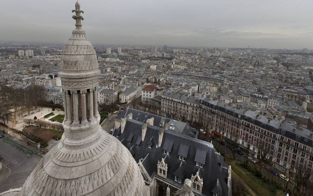 Uitzicht over Parijs vanaf de Basilique du Sacré-Coeur. In Frankrijk wordt elke tien dagen een nieuwe protestantse kerk gesticht. beeld RD, Henk Visscher