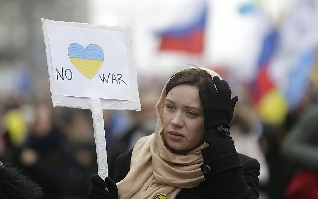 Duizenden mensen zijn zaterdag in Moskou de straat opgegaan om te demonstreren tegen de Russische betrokkenheid bij de crisis in buurland Oekraïne. beeld EPA