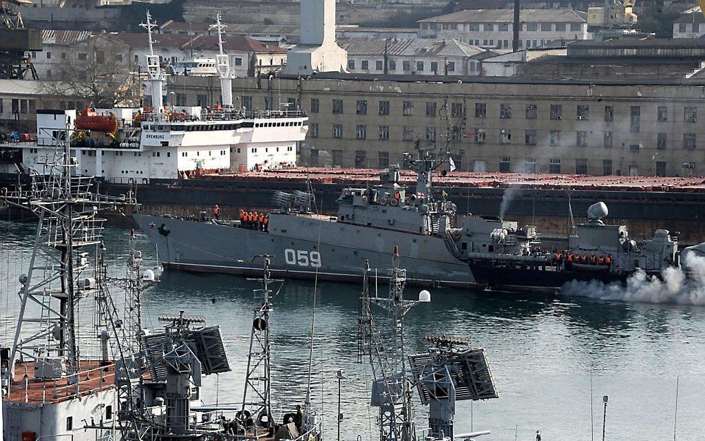 SEBASTOPOL. Een Russisch marineschip meert aan in de haven van Sebastopol op de Krim. beeld AFP