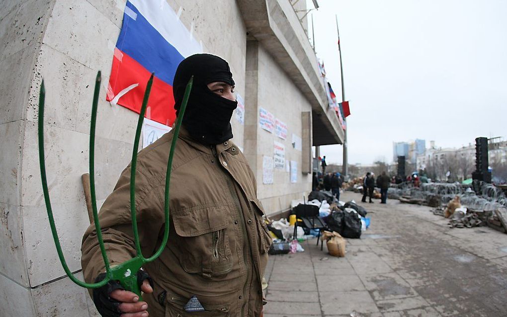 Een pro-Russische demonstrant in Donetsk. beeld AFP