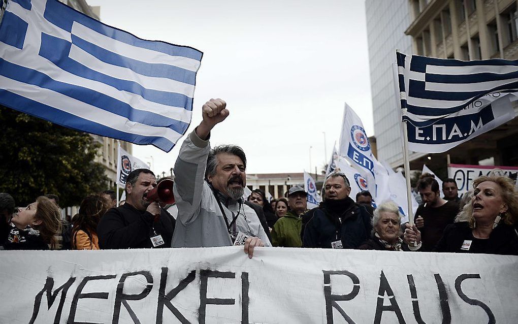 In Athene is niet iedereen blij met de komst van de Duitse bondskanselier Merkel. beeld AFP