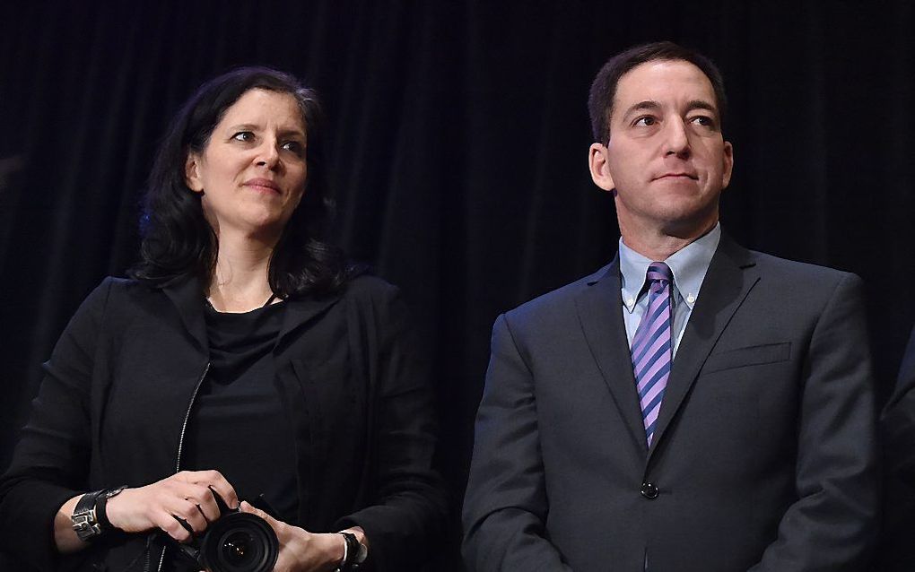 Reporters Laura Poitras en Glenn Greenwald. beeld AFP