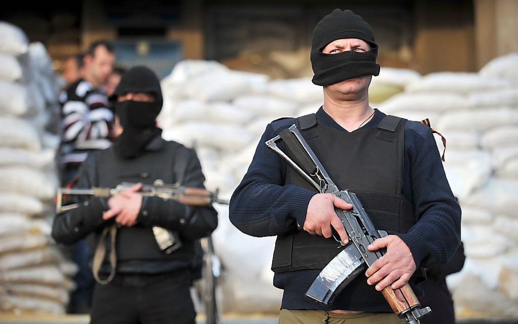 Gewapende pro-Russische demonstranten in de stad Slavyansk. beeld AFP