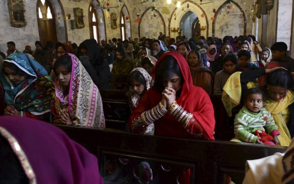 Pakistaanse christenen in gebed. Beeld AFP