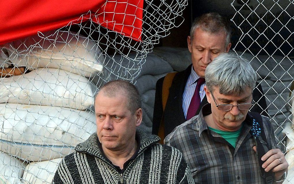 De Zweedse waarnemer (l.) werd zondag vrijgelaten. Foto AFP